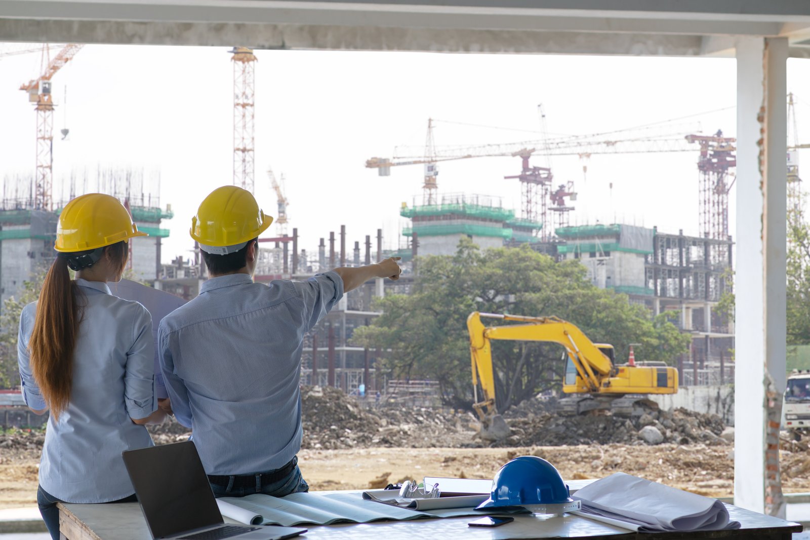 Construction professionals reviewing a building project